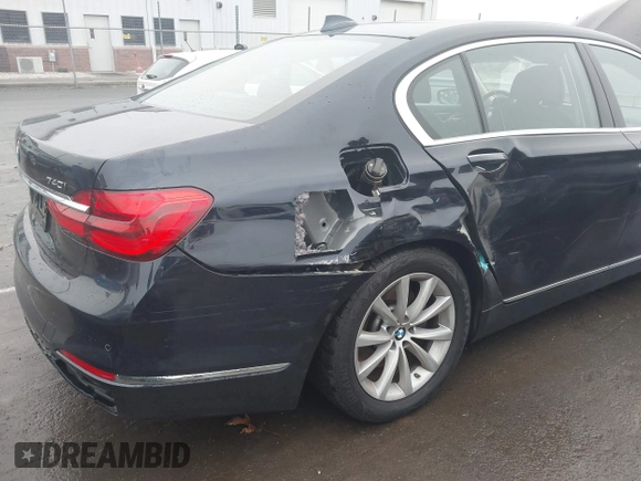 2019 BMW 7 Series 740i xDrive with VIN WBA7E4C52KGV70359, listed as a IAAI auction lot 41421504 with 55,734 mi miles and . Bid and sale history available at carsss.com. Image 6.