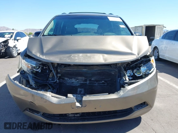2012 Honda Odyssey EX-L z VIN 5FNRL5H63CB033049, wystawiony jako IAAI lot #42260501 z przebiegiem 165 693 mil mil oraz . Historia ofert i sprzedaży dostępna na DreamBid. Obrazek 6.