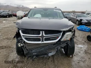 2017 Dodge Journey SXT z VIN 3C4PDDBG0HT609804, wystawiony jako Copart lot #42977015 z przebiegiem 110 450 mil mil oraz Szkoda całkowita • Salvage title. Historia ofert i sprzedaży dostępna na DreamBid. Obrazek 5.