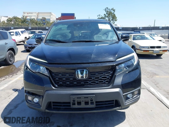 2021 Honda Passport Sport z VIN 5FNYF8H21MB038592, wystawiony jako IAAI lot #41955838 z przebiegiem 31 844 mil mil oraz . Historia ofert i sprzedaży dostępna na DreamBid. Obrazek 12.