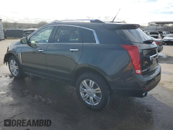 2014 Cadillac SRX Luxury Collection with VIN 3GYFNBE31ES561151, listed as a Copart auction lot 42499575 with 140,677 mi miles and Salvage Title. Bid and sale history available at carsss.com. Image 2.