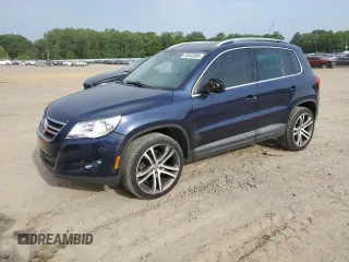 2011 Volkswagen Tiguan SEL w/Premium Navi z VIN WVGAV7AX6BW523898, wystawiony jako Copart lot #56943095 z przebiegiem 110 718 mil mil oraz Czysty tytuł • Clean title. Historia ofert i sprzedaży dostępna na DreamBid. Obrazek 1.