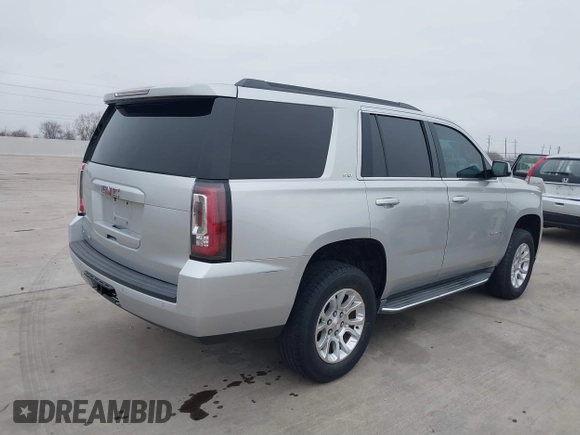 2015 GMC Yukon SLT with VIN 1GKS1BKC3FR253184, listed as a IAAI auction lot 41574610 with 152,543 mi miles. Bid and sale history available at carsss.com. Image 4.