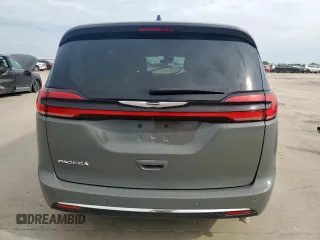 2023 Chrysler Pacifica Hybrid Touring L with VIN 2C4RC1L72PR614075, listed as a Copart auction lot 58586115 with 43,960 mi miles and Salvage title. Bid and sale history available at DreamBid. Image 6.