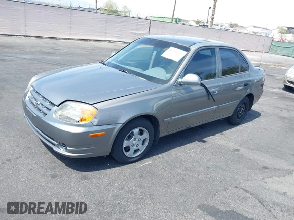 2003 Hyundai Accent GL with VIN KMHCG45C73U471607, listed as a IAAI auction lot 41956551 with 222,305 mi miles. Bid and sale history available at carsss.com. Image 2.