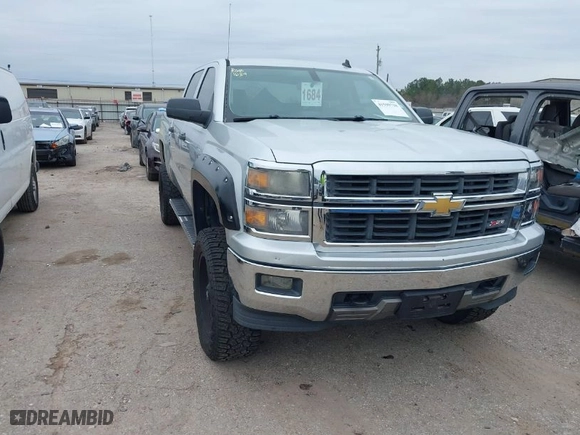 2014 Chevrolet Silverado 1500 LT with VIN 3GCUKRECXEG426462, listed as a IAAI auction lot 41599738 with 193,829 mi miles. Bid and sale history available at carsss.com. Image 1.