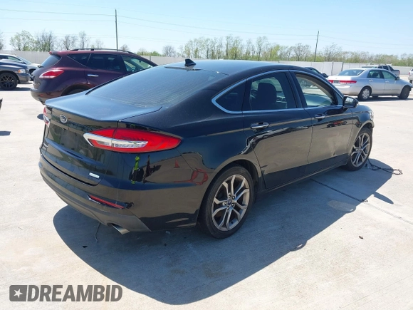 2019 Ford Fusion SEL with VIN 3FA6P0CD2KR113476, listed as a IAAI auction lot 41868614 with 86,650 mi miles. Bid and sale history available at carsss.com. Image 4.
