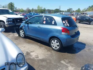 2010 Toyota Yaris with VIN JTDJT4K36A5285298, listed as a IAAI auction lot 42003609 with 158,418 mi miles. Bid and sale history available at carsss.com. Image 3.