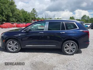2022 Cadillac XT6 Premium Luxury with VIN 1GYKPCRS4NZ145145, listed as a IAAI auction lot 42533642 with 36,450 mi miles and . Bid and sale history available at DreamBid. Image 14.