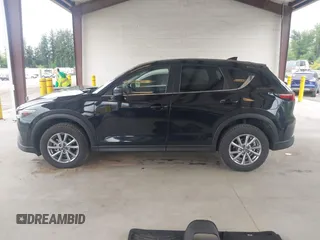 2023 Mazda CX-5 S Carbon Edition z VIN JM3KFBCM8P0140333, wystawiony jako IAAI lot #42292848 z przebiegiem 49 587 mil mil oraz . Historia ofert i sprzedaży dostępna na DreamBid. Obrazek 15.