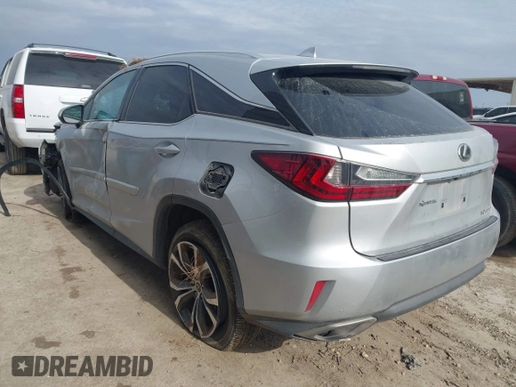 2019 Lexus RX with VIN 2T2ZZMCA3KC135292, listed as a IAAI auction lot 41573153 with 106,971 mi miles. Bid and sale history available at carsss.com. Image 3.
