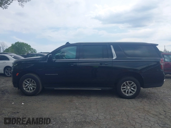 2021 Chevrolet Suburban LT z VIN 1GNSCCKD5MR170901, wystawiony jako IAAI lot #42005533 z przebiegiem 174 410 mil mil oraz . Historia ofert i sprzedaży dostępna na DreamBid. Obrazek 14.