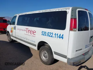 2001 Chevrolet Express with VIN 1GAHG39R211180863, listed as a IAAI auction lot 41855235 with 148,672 mi miles. Bid and sale history available at carsss.com. Image 3.