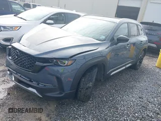 2023 Mazda CX-50 2.5 Turbo with VIN 7MMVABXY5PN129813, listed as a IAAI auction lot 41284262 with 15,192 mi miles. Bid and sale history available at carsss.com. Image 2.