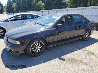 2000 BMW 5 Series 540i with VIN WBADN634XYGM66698, listed as a Copart auction lot 66963795 with 187,251 mi miles and Clean title. Bid and sale history available at DreamBid. Image 1.