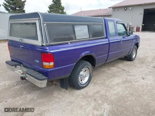 1997 Ford Ranger XL with VIN 1FTCR14A7VPA20353, listed as a IAAI auction lot 41986712 with 136,315 mi miles. Bid and sale history available at carsss.com. Image 4.