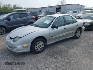 2000 Pontiac Sunfire SE z VIN 1G2JB5249Y7442701, wystawiony jako IAAI lot #42098956 z przebiegiem 99 975 mil mil oraz . Historia ofert i sprzedaży dostępna na DreamBid. Obrazek 2.
