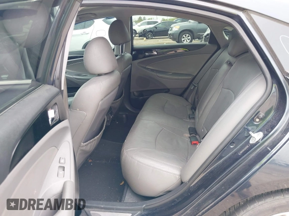 2012 Hyundai Sonata SE z VIN 5NPEC4AC7CH341786, wystawiony jako IAAI lot #41890326 z przebiegiem 114 678 mil mil oraz . Historia ofert i sprzedaży dostępna na DreamBid. Obrazek 8.