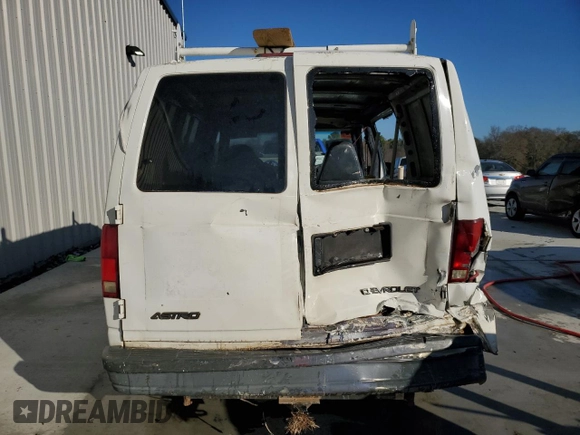 2004 Chevrolet Astro Cargo z VIN 1GCDM19X74B117502, wystawiony jako Copart lot #87210454 z przebiegiem Nie podano mil oraz Szkoda całkowita • Salvage title. Historia ofert i sprzedaży dostępna na DreamBid. Obrazek 6.