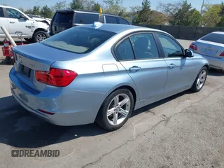 2014 BMW 3 Series 328i with VIN WBA3C1C51EK115278, listed as a IAAI auction lot 41979591 with 129,112 mi miles. Bid and sale history available at carsss.com. Image 4.