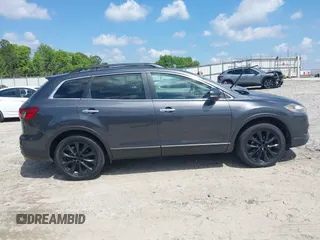 2014 Mazda CX-9 Grand Touring with VIN JM3TB2DA4E0436340, listed as a IAAI auction lot 42442249 with 102,856 mi miles and . Bid and sale history available at DreamBid. Image 13.