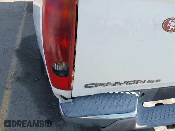 2005 GMC Canyon 1SB SLE Z85 z VIN 1GTCS136958199913, wystawiony jako IAAI lot #41451237 z przebiegiem 178 319 mil mil oraz . Historia ofert i sprzedaży dostępna na DreamBid. Obrazek 18.