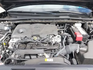2023 Toyota Camry SE z VIN 4T1G11BK4PU096200, wystawiony jako IAAI lot #41888416 z przebiegiem 25 072 mil mil oraz . Historia ofert i sprzedaży dostępna na DreamBid. Obrazek 10.