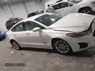 2019 Ford Fusion Hybrid SEL with VIN 3FA6P0MU8KR272811, listed as a IAAI auction lot 41705282 with 56,565 mi miles. Bid and sale history available at carsss.com. Image 13.
