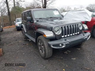 2018 Jeep Wrangler Unlimited Sahara with VIN 1C4HJXEG1JW115963, listed as a IAAI auction lot 41239532 with 101,520 mi miles. Bid and sale history available at carsss.com. Image 1.