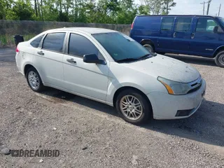 2009 Ford Focus SE z VIN 1FAHP35N29W170350, wystawiony jako IAAI lot #42009207 z przebiegiem 140 937 mil mil oraz . Historia ofert i sprzedaży dostępna na DreamBid. Obrazek 1.