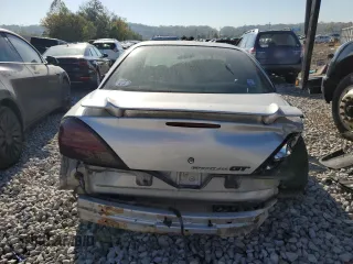 2004 Pontiac Grand Am GT with VIN 1G2NW52E64C130013, listed as a Copart auction lot 74018514 with 165,657 mi miles and Salvage Title. Bid and sale history available at carsss.com. Image 6.