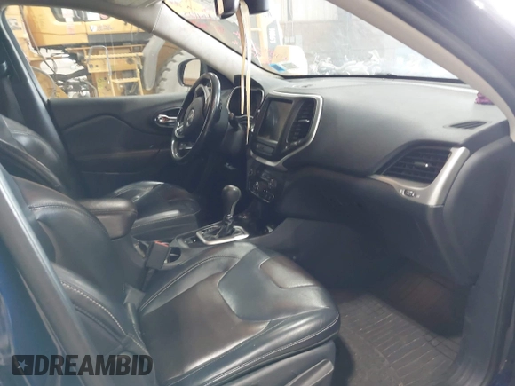 2015 Jeep Cherokee Limited with VIN 1C4PJMDB4FW775065, listed as a IAAI auction lot 42044247 with 125,131 mi miles and . Bid and sale history available at DreamBid. Image 5.