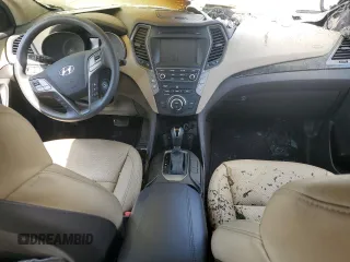 2017 Hyundai Santa Fe 2.4L z VIN 5NMZUDLB9HH013230, wystawiony jako Copart lot #55888975 z przebiegiem Nie podano mil oraz Szkoda całkowita • Salvage title. Historia ofert i sprzedaży dostępna na DreamBid. Obrazek 8.