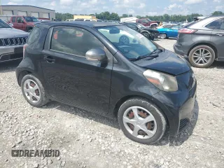 2014 Scion iQ with VIN JTNJJXB07EJ028558, listed as a Copart auction lot 64745345 with 112,221 mi miles and Clean title. Bid and sale history available at DreamBid. Image 4.