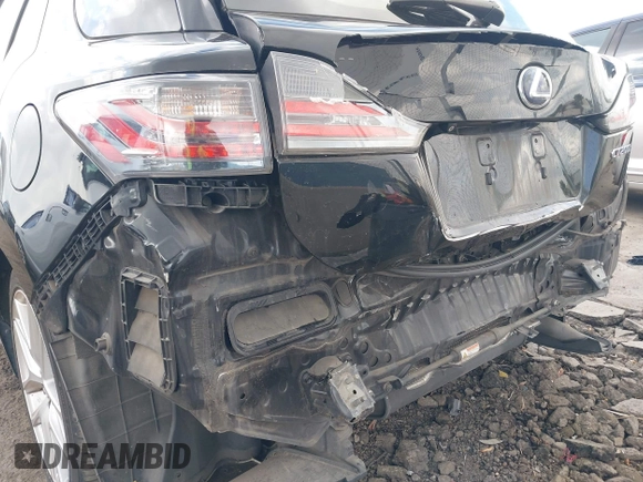 2014 Lexus CT 200h with VIN JTHKD5BH7E2176857, listed as a IAAI auction lot 42128567 with 151,899 mi miles and . Bid and sale history available at DreamBid. Image 6.