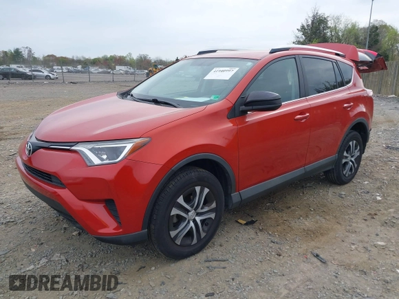 2016 Toyota RAV4 LE with VIN 2T3BFREV6GW516014, listed as a IAAI auction lot 41940997 with 74,129 mi miles. Bid and sale history available at carsss.com. Image 2.