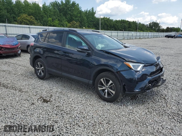 2018 Toyota RAV4 XLE with VIN 2T3WFREVXJW483012, listed as a Copart auction lot 58806205 with 48,266 mi miles and Salvage title. Bid and sale history available at DreamBid. Image 4.