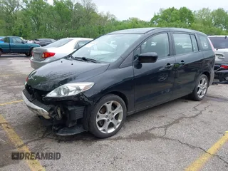 2010 Mazda 5 Sport with VIN JM1CR2W33A0360848, listed as a IAAI auction lot 42104824 with 151,084 mi miles and . Bid and sale history available at DreamBid. Image 18.