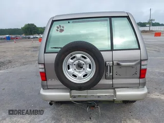 2002 Isuzu Trooper S with VIN JACDJ58X527J07745, listed as a IAAI auction lot 42714673 with 122,482 mi miles and . Bid and sale history available at DreamBid. Image 16.
