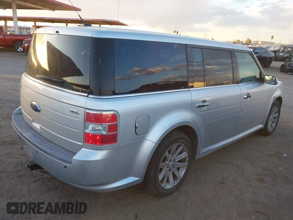 2012 Ford Flex SEL z VIN 2FMGK5CC0CBD03242, wystawiony jako IAAI lot #42159585 z przebiegiem 155 128 mil mil oraz . Historia ofert i sprzedaży dostępna na DreamBid. Obrazek 4.
