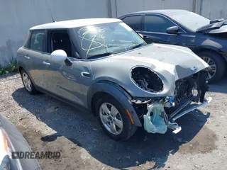 2016 MINI Hardtop 4 Door with VIN WMWXU1C54G2D09260, listed as a IAAI auction lot 42676831 with 64,848 mi miles and . Bid and sale history available at DreamBid. Image 1.
