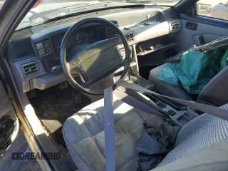 1993 Ford Mustang с VIN 1FACP41M6PF186870, выставлен на аукционе Copart как лот 87487744 с пробегом 37 671 миль миль и Списание • Salvage title. История ставок и продаж доступна на DreamBid. Изображение 8.