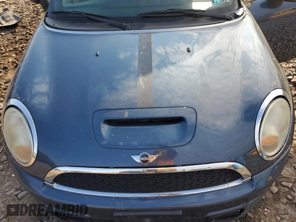 2011 MINI Convertible S with VIN WMWZP3C57BTX83599, listed as a Copart auction lot 47701505 with Not Provided miles and Clean Title. Bid and sale history available at DreamBid. Image 11.