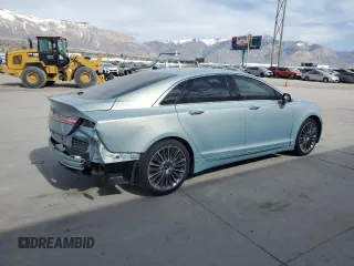 2014 Lincoln MKZ Hybrid with VIN 3LN6L2LU9ER808684, listed as a Copart auction lot 52974105 with 123,486 mi miles and Salvage Title. Bid and sale history available at DreamBid. Image 3.