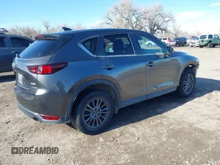 2019 Mazda CX-5 Touring with VIN JM3KFBCM7K0611896, listed as a IAAI auction lot 41732111 with 90,826 mi miles. Bid and sale history available at carsss.com. Image 4.