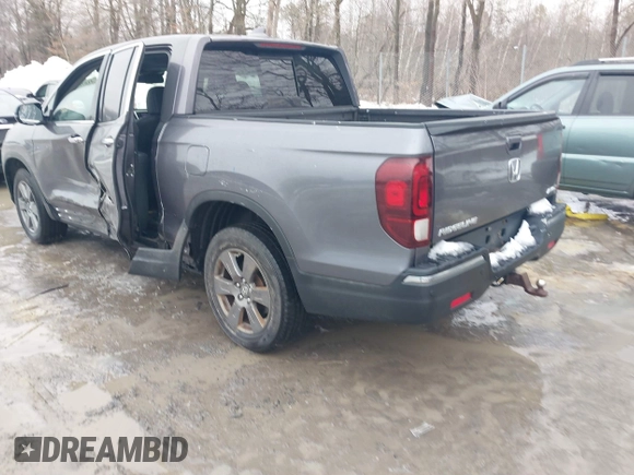 2020 Honda Ridgeline RTL-E with VIN 5FPYK3F70LB015422, listed as a IAAI auction lot 41578369 with 78,860 mi miles and . Bid and sale history available at DreamBid. Image 3.