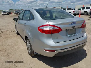 2016 Ford Fiesta SE with VIN 3FADP4BJ4GM101162, listed as a IAAI auction lot 42240414 with 216,099 mi miles and . Bid and sale history available at DreamBid. Image 3.