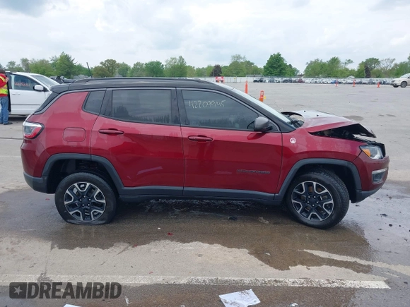 2021 Jeep Compass Trailhawk with VIN 3C4NJDDB6MT502932, listed as a IAAI auction lot 42209945 with 63,119 mi miles and . Bid and sale history available at DreamBid. Image 13.