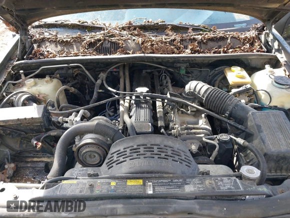 1993 Jeep Grand Cherokee Laredo with VIN 1J4GZ58S1PC680016, listed as a IAAI auction lot 41813392 with 149,520 mi miles. Bid and sale history available at carsss.com. Image 10.