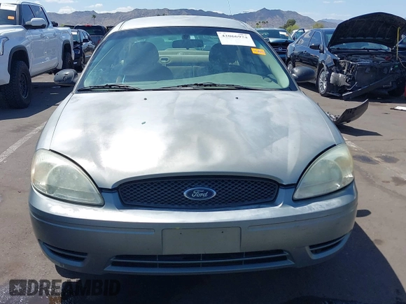 2005 Ford Taurus SE with VIN 1FAFP53U75A226240, listed as a IAAI auction lot 42066974 with 190,043 mi miles. Bid and sale history available at carsss.com. Image 12.